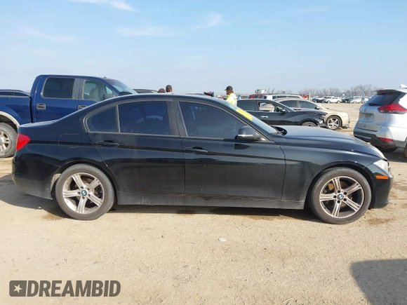 2013 BMW 3 Series 328i with VIN WBA3C1C51DF440679, listed as a IAAI auction lot 41533587 with 184,812 mi miles. Bid and sale history available at carsss.com. Image 13.