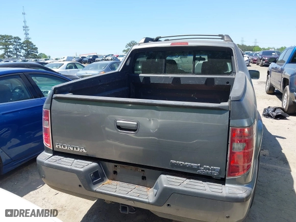 2009 Honda Ridgeline RTS with VIN 5FPYK16409B105186, listed as a IAAI auction lot 42003632 with 153,072 mi miles. Bid and sale history available at carsss.com. Image 15.