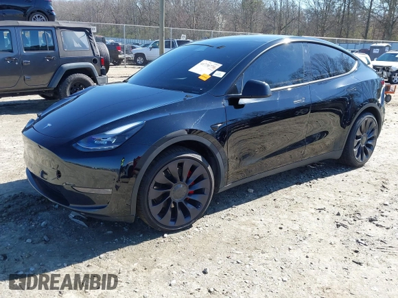2021 Tesla Model Y Performance with VIN 5YJYGDEF6MF252877, listed as a IAAI auction lot 41770770 with 58,550 mi miles and . Bid and sale history available at DreamBid. Image 20.