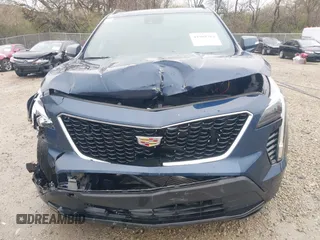 2021 Cadillac XT4 AWD Sport with VIN 1GYFZFR45MF053573, listed as a IAAI auction lot 41909784 with 36,309 mi miles and . Bid and sale history available at DreamBid. Image 6.