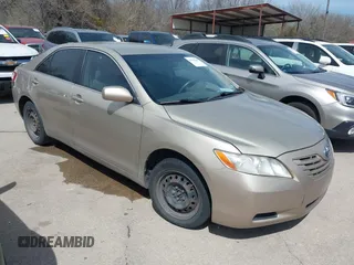 2007 Toyota Camry CE with VIN 4T1BE46K97U694647, listed as a IAAI auction lot 41798640 with 184,986 mi miles. Bid and sale history available at carsss.com. Image 1.
