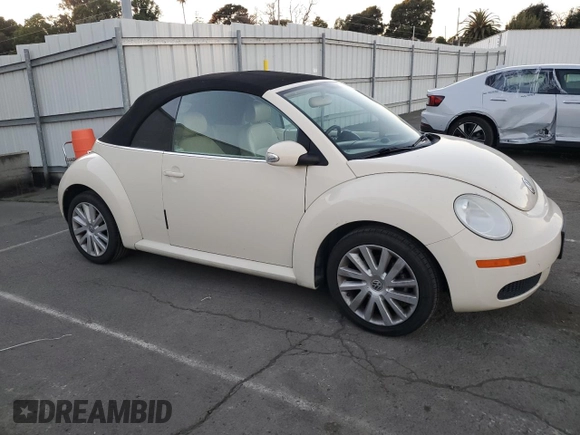 2009 Volkswagen Beetle S with VIN 3VWRF31Y29M409328, listed as a Copart auction lot 87849455 with 69,693 mi miles and Salvage title. Bid and sale history available at DreamBid. Image 4.