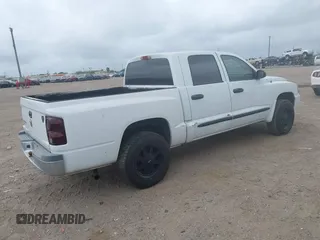 2006 Dodge Dakota SLT with VIN 1D7HE48K56S532946, listed as a IAAI auction lot 41878467 with 106,218 mi miles. Bid and sale history available at carsss.com. Image 4.