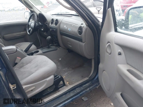 2002 Jeep Liberty Sport with VIN 1J8GL48K32W132617, listed as a IAAI auction lot 41732799 with 202,894 mi miles. Bid and sale history available at carsss.com. Image 5.