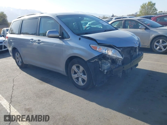 2013 Toyota Sienna LE AAS with VIN 5TDKK3DC6DS371126, listed as a IAAI auction lot 42006353 with 141,425 mi miles. Bid and sale history available at carsss.com. Image 1.