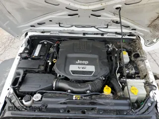 2017 Jeep Wrangler Willys Wheeler with VIN 1C4AJWAG7HL589574, listed as a Copart auction lot 79006504 with 117,075 mi miles and Salvage Title. Bid and sale history available at DreamBid. Image 12.