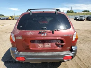 2002 Hyundai Santa Fe GLS with VIN KM8SC73D42U231286, listed as a Copart auction lot 71290624 with 187,534 mi miles and Salvage Title. Bid and sale history available at carsss.com. Image 6.