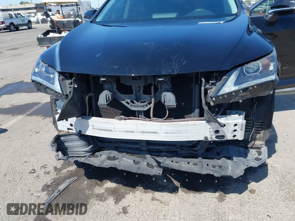 2016 Lexus RX 350 z VIN 2T2BZMCA6GC002373, wystawiony jako IAAI lot #42356683 z przebiegiem 107 067 mil mil oraz . Historia ofert i sprzedaży dostępna na DreamBid. Obrazek 6.
