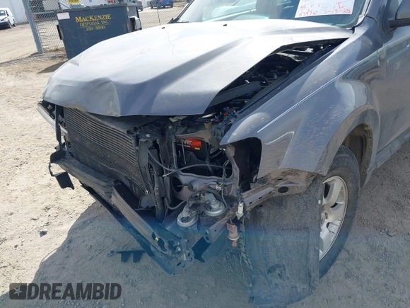 2011 Ford Escape Limited with VIN 1FMCU9EG4BKA57669, listed as a IAAI auction lot 41785314 with 83,970 mi miles. Bid and sale history available at carsss.com. Image 6.