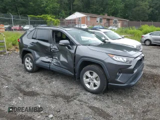 2019 Toyota RAV4 XLE with VIN 2T3P1RFVXKC026527, listed as a Copart auction lot 63665935 with 61,056 mi miles and Salvage title. Bid and sale history available at DreamBid. Image 4.