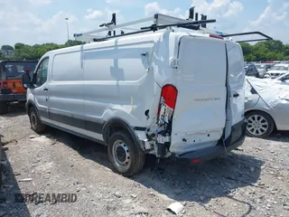 2024 Ford Transit Cargo with VIN 1FTBR1Y89RKA77093, listed as a IAAI auction lot 42556386 with 3,290 mi miles and . Bid and sale history available at DreamBid. Image 3.