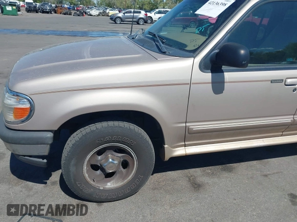 1998 Ford Explorer XL z VIN 1FMZU34E0WZA85991, wystawiony jako IAAI lot #42136398 z przebiegiem 221 454 mil mil oraz . Historia ofert i sprzedaży dostępna na DreamBid. Obrazek 6.