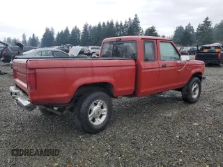 1990 Ford Ranger XLT with VIN 1FTCR15X6LPB44730, listed as a Copart auction lot 87076334 with 91,204 mi miles and Salvage Title. Bid and sale history available at DreamBid. Image 3.