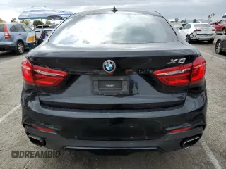 2017 BMW X6 xDrive35i z VIN 5UXKU2C39H0X47816, wystawiony jako Copart lot #53553385 z przebiegiem 123 036 mil mil oraz Szkoda całkowita • Salvage title. Historia ofert i sprzedaży dostępna na DreamBid. Obrazek 6.
