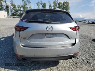 2018 Mazda CX-5 Grand Touring с VIN JM3KFBDM5J0323923, выставлен на аукционе Copart как лот 58162435 с пробегом 144 792 миль миль и Списание • Salvage title. История ставок и продаж доступна на DreamBid. Изображение 6.