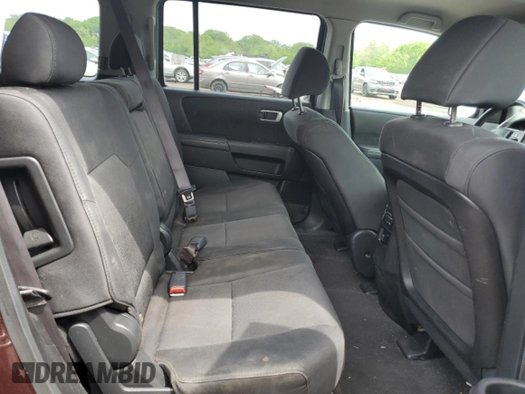 2010 Honda Pilot LX z VIN 5FNYF4H20AB003479, wystawiony jako Copart lot #57418765 z przebiegiem 177 219 mil mil oraz Szkoda całkowita • Salvage title. Historia ofert i sprzedaży dostępna na DreamBid. Obrazek 11.