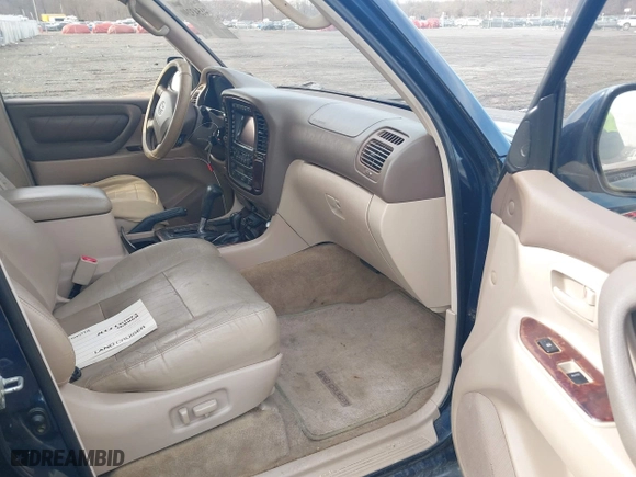 2002 Toyota Land Cruiser with VIN JTEHT05J122018974, listed as a IAAI auction lot 41543290 with 266,926 mi miles. Bid and sale history available at carsss.com. Image 5.