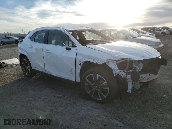 2022 Lexus UX 250h F Sport with VIN JTHE9JBHXN2057983, listed as a Copart auction lot 46143515 with 27,367 mi miles and Salvage Title. Bid and sale history available at DreamBid. Image 4.