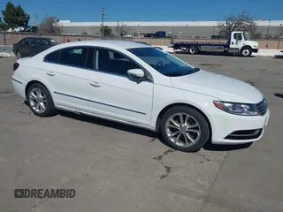 2016 Volkswagen CC Sport with VIN WVWBP7AN7GE500242, listed as a IAAI auction lot 41760893 with 42,401 mi miles. Bid and sale history available at carsss.com. Image 1.