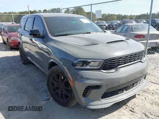2023 Dodge Durango SRT Hellcat Premium with VIN 1C4SDJH95PC695459, listed as a IAAI auction lot 41856168 with 6,163 mi miles and . Bid and sale history available at DreamBid. Image 1.
