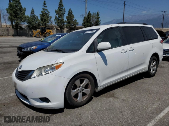 2014 Toyota Sienna LE AAS with VIN 5TDKK3DC8ES442280, listed as a Copart auction lot 59374985 with 207,563 mi miles and Salvage title. Bid and sale history available at DreamBid. Image 1.