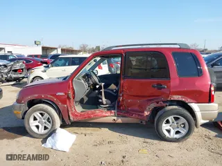 2002 Suzuki Grand Vitara JLX with VIN JS3TD62V824152943, listed as a IAAI auction lot 41668395 with 104,191 mi miles. Bid and sale history available at carsss.com. Image 15.