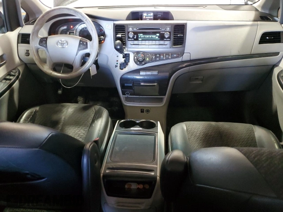 2014 Toyota Sienna SE with VIN 5TDXK3DC5ES418508, listed as a Copart auction lot 69742974 with 210,168 mi miles and Salvage Title. Bid and sale history available at DreamBid. Image 8.