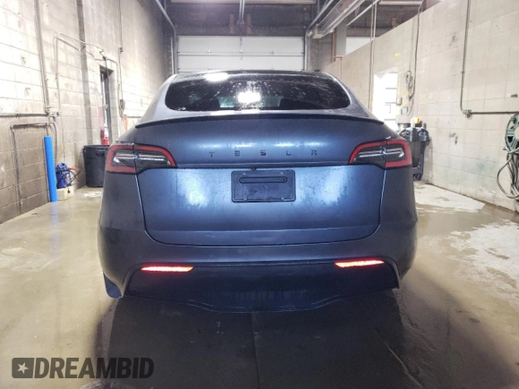 2021 Tesla Model Y Performance with VIN 5YJYGDEF2MF134700, listed as a Copart auction lot 56325685 with 66,730 mi miles and Salvage Title. Bid and sale history available at DreamBid. Image 6.