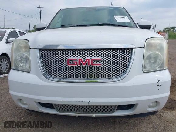 2007 GMC Yukon Denali z VIN 1GKFK63807J246645, wystawiony jako IAAI lot #42290133 z przebiegiem 187 480 mil mil oraz . Historia ofert i sprzedaży dostępna na DreamBid. Obrazek 6.