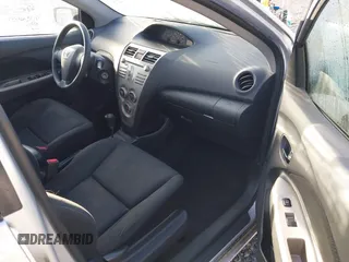 2009 Toyota Yaris with VIN JTDBT903194041550, listed as a IAAI auction lot 41993832 with 214,544 mi miles. Bid and sale history available at carsss.com. Image 5.