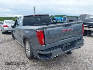 2019 GMC Sierra 1500 Denali with VIN 1GTU9FEL7KZ355632, listed as a IAAI auction lot 42487913 with 51,467 mi miles and . Bid and sale history available at DreamBid. Image 3.