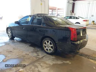 2003 Cadillac CTS with VIN 1G6DM57N630145426, listed as a IAAI auction lot 42141105 with 203,859 mi miles. Bid and sale history available at carsss.com. Image 3.
