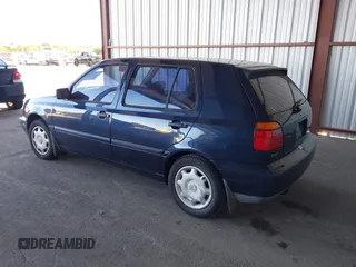 1997 Volkswagen Golf z VIN 3VWFA81H3VM089008, wystawiony jako IAAI lot #41821504 z przebiegiem 118 715 mil mil oraz . Historia ofert i sprzedaży dostępna na DreamBid. Obrazek 3.