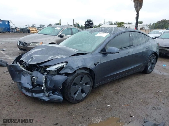 2022 Tesla Model 3 Long Range with VIN 5YJ3E1EBXNF138538, listed as a IAAI auction lot 41771647 with 31,250 mi miles. Bid and sale history available at carsss.com. Image 2.