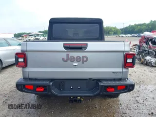 2020 Jeep Gladiator Rubicon z VIN 1C6JJTBG7LL181833, wystawiony jako IAAI lot #42493073 z przebiegiem 13 775 mil mil oraz . Historia ofert i sprzedaży dostępna na DreamBid. Obrazek 16.