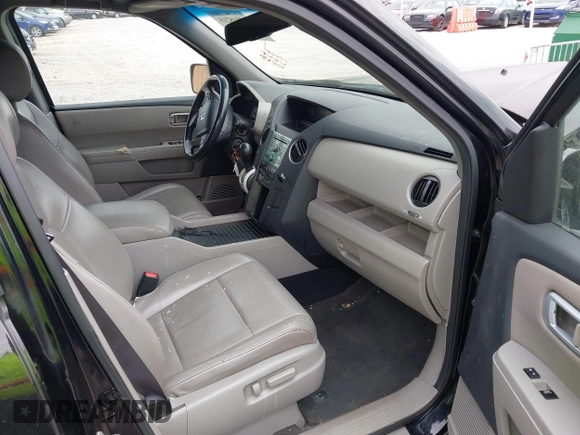 2011 Honda Pilot EX-L with VIN 5FNYF4H59BB039862, listed as a IAAI auction lot 42048218 with 174,102 mi miles and . Bid and sale history available at carsss.com. Image 5.