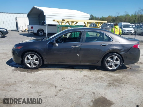 2010 Acura TSX with VIN JH4CU2F63AC003630, listed as a IAAI auction lot 42002216 with 131,244 mi miles. Bid and sale history available at carsss.com. Image 14.