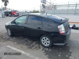 2007 Toyota Prius with VIN JTDKB20U977660315, listed as a IAAI auction lot 42097560 with 158,187 mi miles. Bid and sale history available at carsss.com. Image 3.