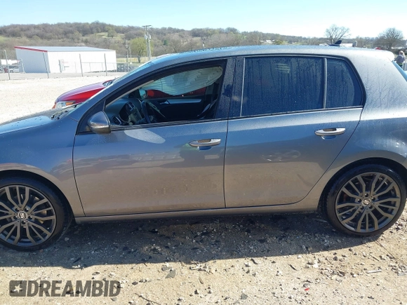 2012 Volkswagen Golf TDI z VIN WVWDM7AJ9CW240204, wystawiony jako IAAI lot #41837287 z przebiegiem 172 512 mil mil oraz . Historia ofert i sprzedaży dostępna na DreamBid. Obrazek 14.