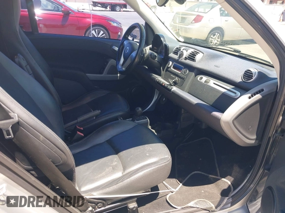 2013 Smart fortwo Pure с VIN WMEEJ3BA6DK676071, выставлен на аукционе IAAI как лот 42677618 с пробегом 191 709 миль миль и . История ставок и продаж доступна на DreamBid. Изображение 5.