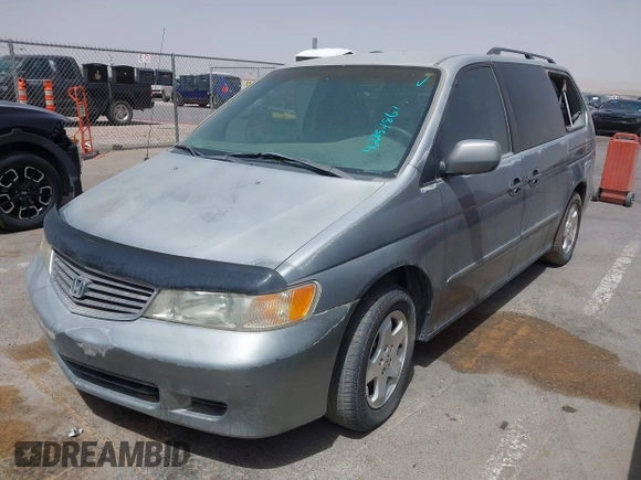 2000 Honda Odyssey EX with VIN 2HKRL1865YH569356, listed as a IAAI auction lot 42257861 with Not provided miles and . Bid and sale history available at DreamBid. Image 2.