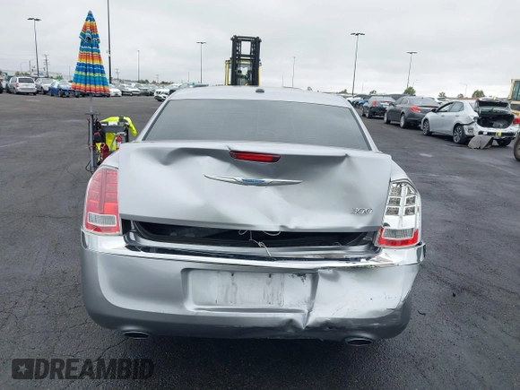 2014 Chrysler 300 with VIN 2C3CCAAG7EH249196, listed as a IAAI auction lot 42180023 with 48,241 mi miles and . Bid and sale history available at DreamBid. Image 17.