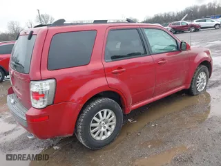 2010 Mercury Mariner Premier with VIN 4M2CN8H76AKJ25549, listed as a IAAI auction lot 41582063 with 201,521 mi miles. Bid and sale history available at carsss.com. Image 4.