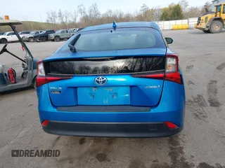2021 Toyota Prius L Eco with VIN JTDKAMFU5M3145949, listed as a IAAI auction lot 42113123 with 127,872 mi miles and . Bid and sale history available at DreamBid. Image 16.