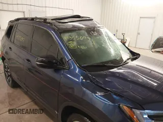 2022 Honda Passport Elite z VIN 5FNYF8H05NB013145, wystawiony jako IAAI lot #41355097 z przebiegiem 45 615 mil mil oraz . Historia ofert i sprzedaży dostępna na DreamBid. Obrazek 12.