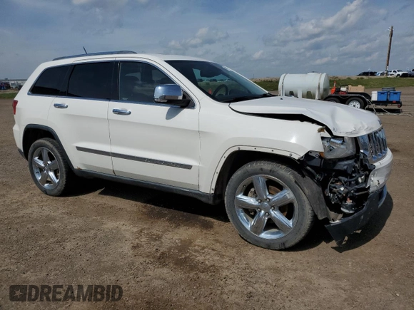 2011 Jeep Grand Cherokee Overland with VIN 1J4RR6GG3BC718723, listed as a Copart auction lot 64975275 with 272,922 mi miles and Salvage title. Bid and sale history available at DreamBid. Image 4.
