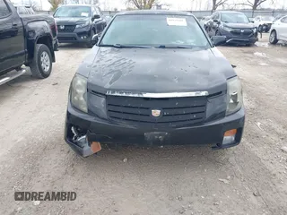 2006 Cadillac CTS with VIN 1G6DM57T660169437, listed as a IAAI auction lot 41879101 with 160,500 mi miles. Bid and sale history available at carsss.com. Image 6.