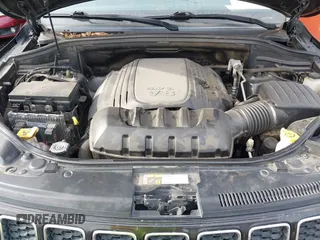 2015 Jeep Grand Cherokee Overland with VIN 1C4RJFCT4FC138404, listed as a IAAI auction lot 41188085 with 152,486 mi miles. Bid and sale history available at carsss.com. Image 10.