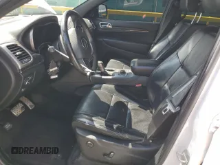 2018 Jeep Grand Cherokee High Altitude with VIN 1C4RJFCT9JC293653, listed as a Copart auction lot 58833145 with 96,808 mi miles and Salvage title. Bid and sale history available at DreamBid. Image 7.