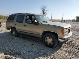 1999 GMC Yukon with VIN 1GKEK13R5XJ725991, listed as a Copart auction lot 71176784 with 245,481 mi miles and Clean Title. Bid and sale history available at carsss.com. Image 4.